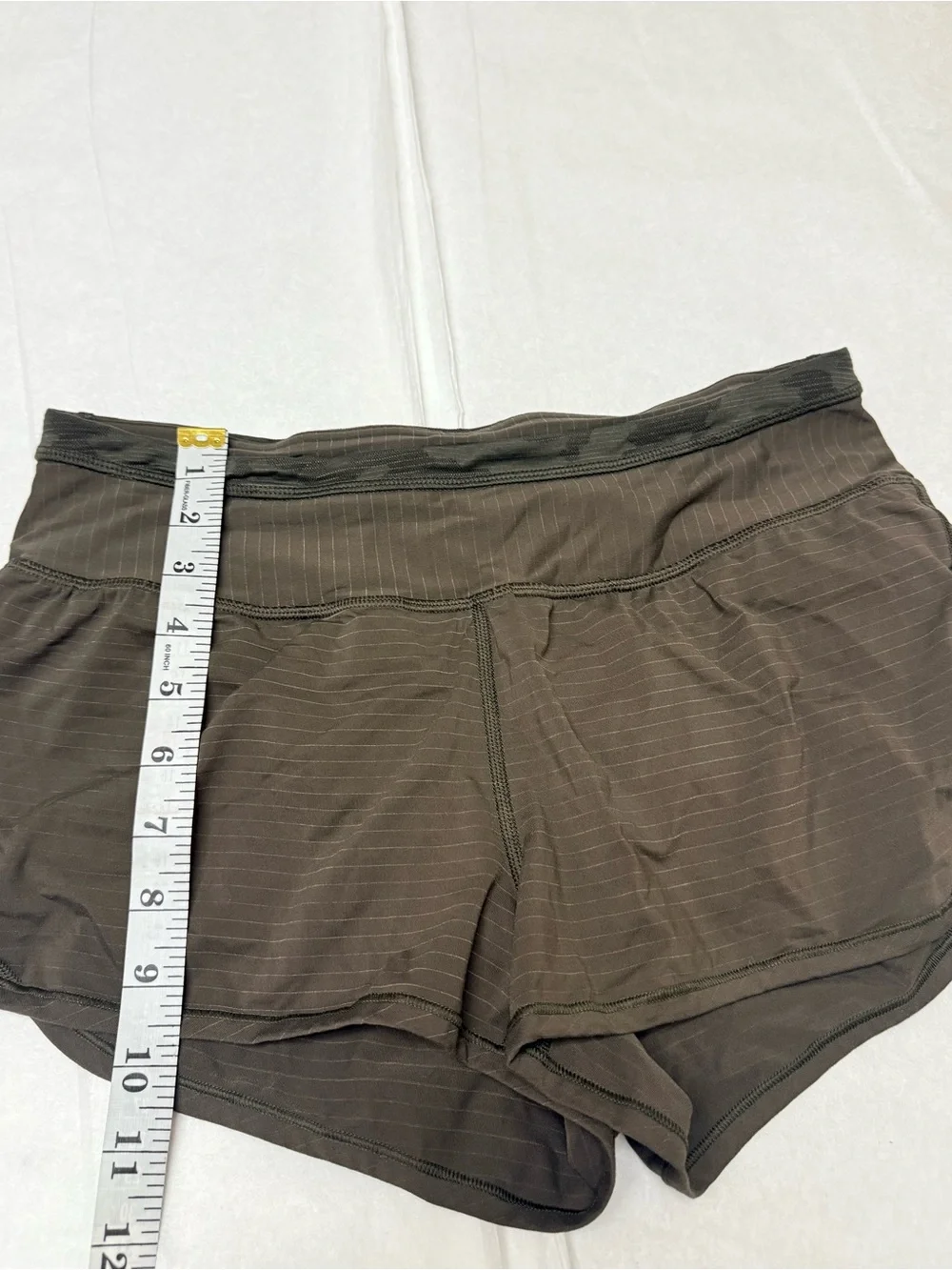 lululemon athletica Speed Up Shorts in a dark earth or olive green 🟢
